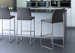 Curvo barstool and counterstool